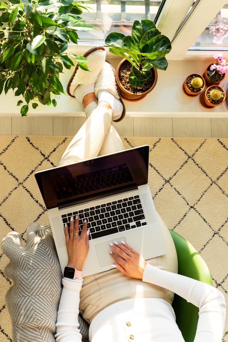 Woman Using Her Laptop at Home